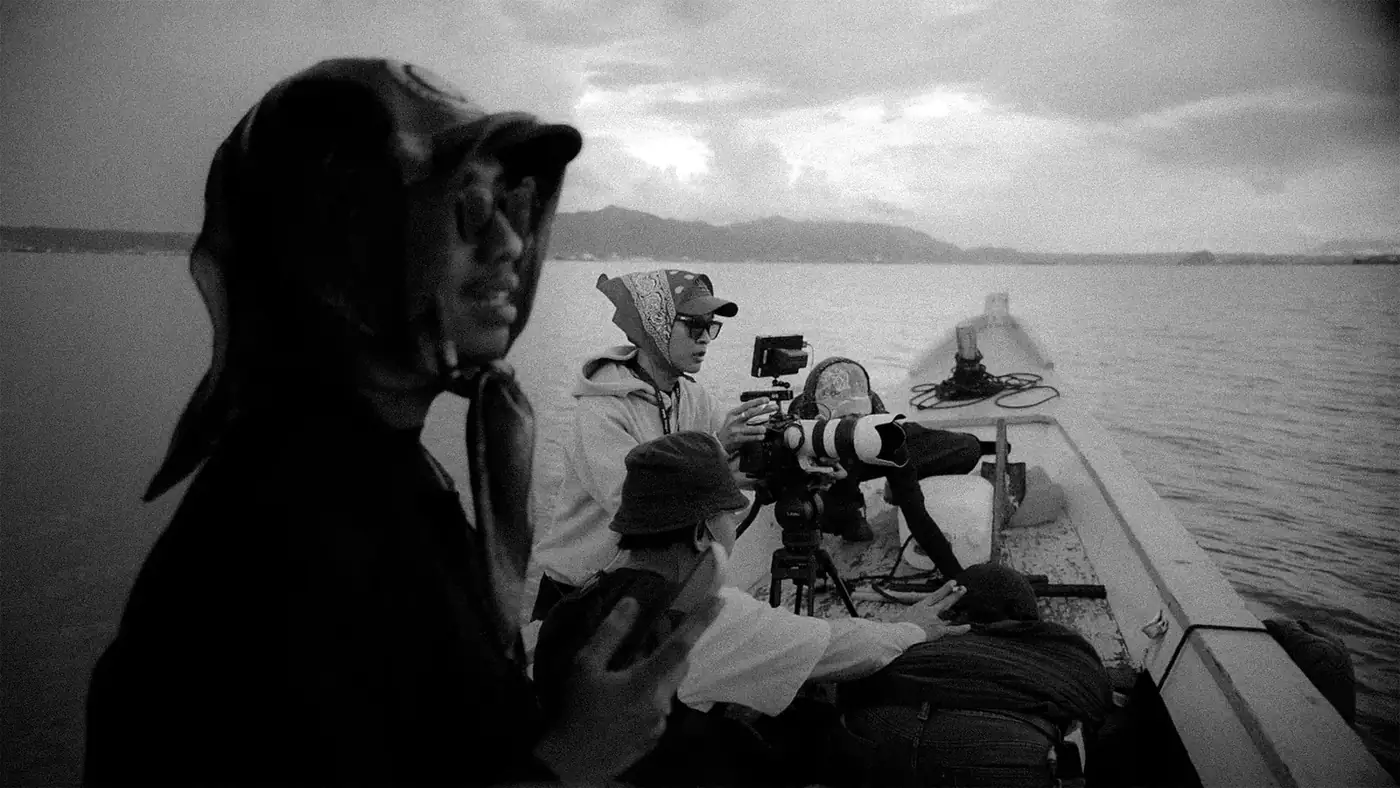 Pink Magic Pixel crew working on location on a boat